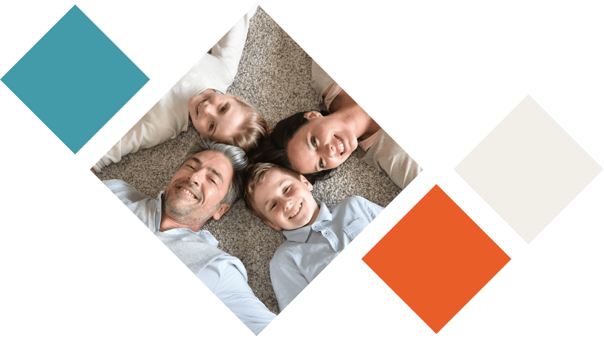 Various coloured diamonds with one having a picture of a family laying on the floor together